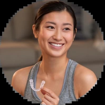 photo-3-up-women-in-gray-tank-holding-aligner